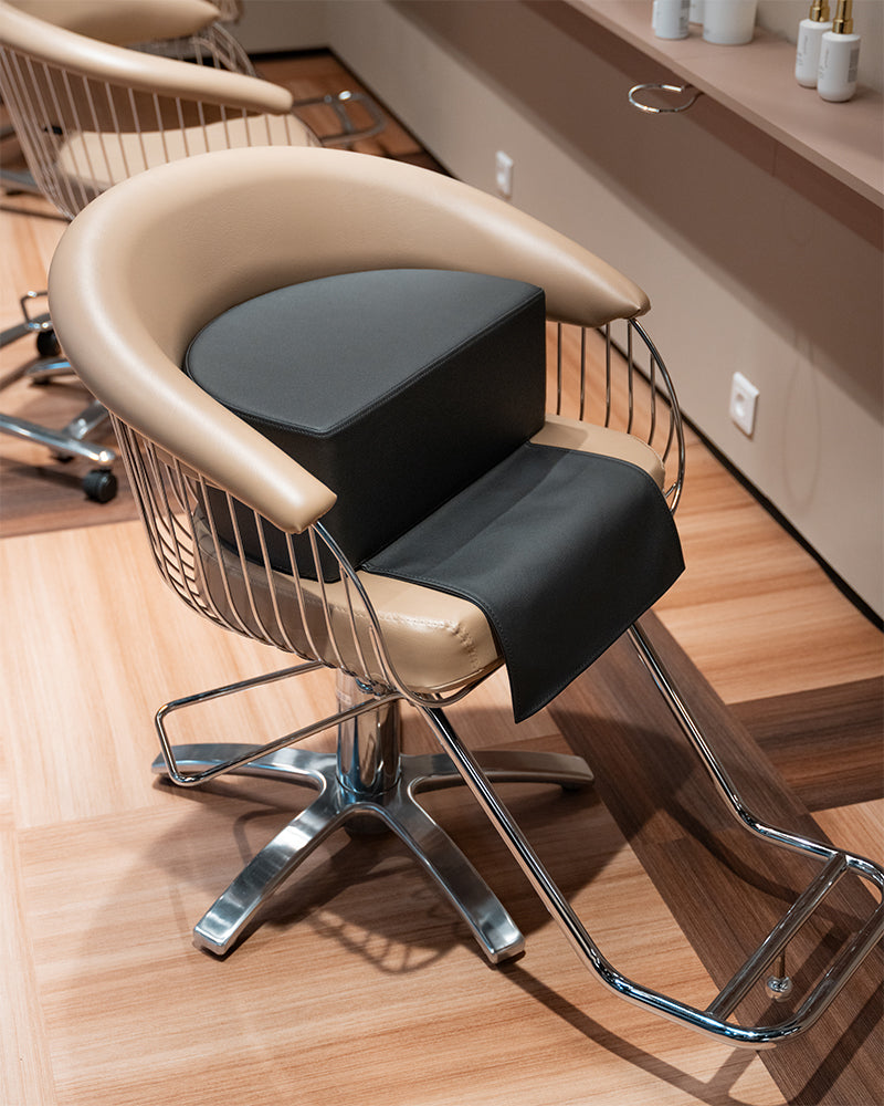 Elevador infantil para sillón de peluquería